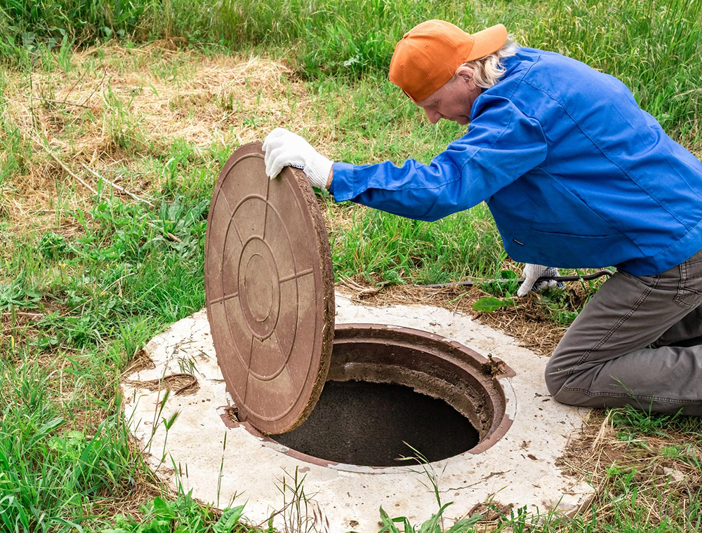 A septic tank being serviced by a professional technician