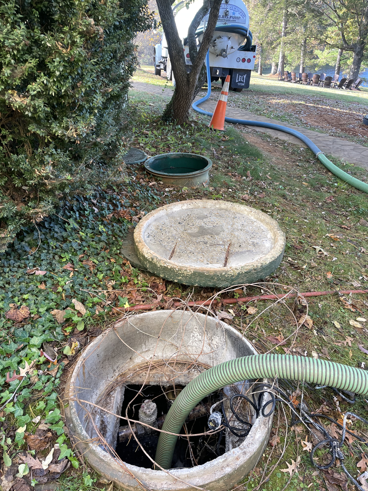 A septic tank being pumped by a professional service provider