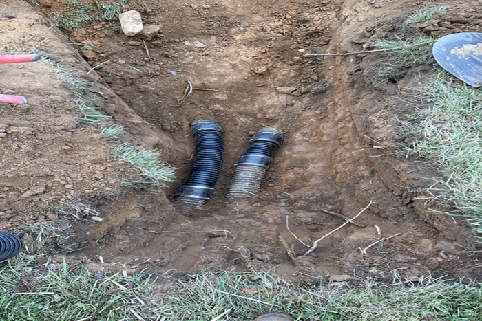 Underground Sewer Line Replacement Using Corrugated Piping