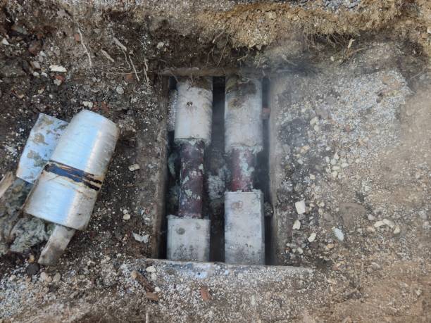 Damaged distribution box and pipes, repair work in progress